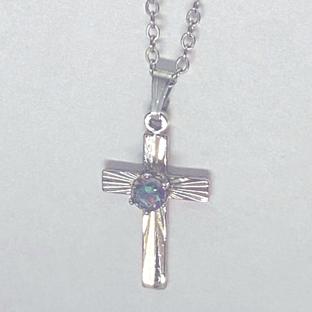 Two silver necklaces and a cuff link